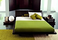 Кровать Morning. Morning Letto Morning rivestito integralmente in cuoio color testa di moro. Design: Opera Work in Progress.